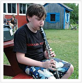 boy playing clarinet